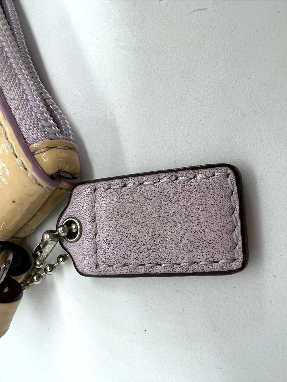 Coach Beige Patent Leather Perforated Signature C Wristlet Lilac Trim